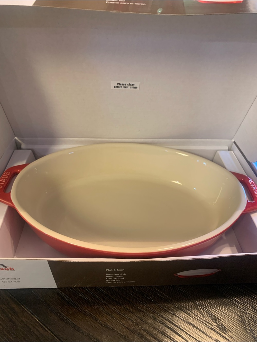 NEVER USED! Staub Red Oval Ceramic roasting dish with Cream Interior